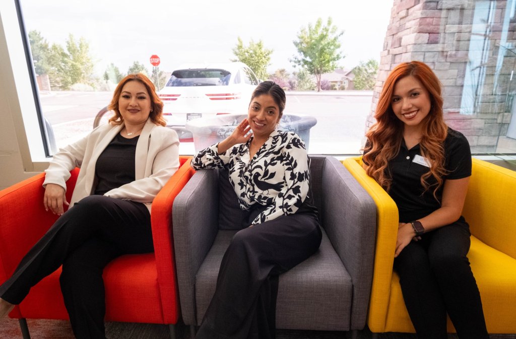 3 Women on photo Setting on sofa