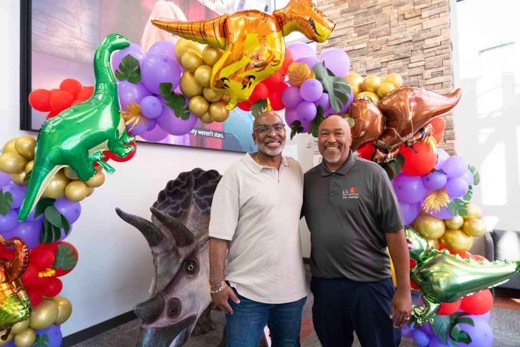Two Men on Photo Smilling