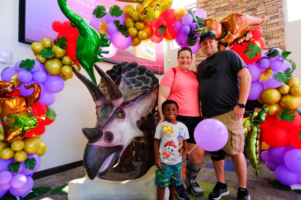 Staff on photo with children