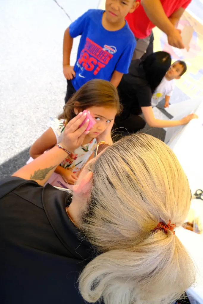 Staff on photo with children
