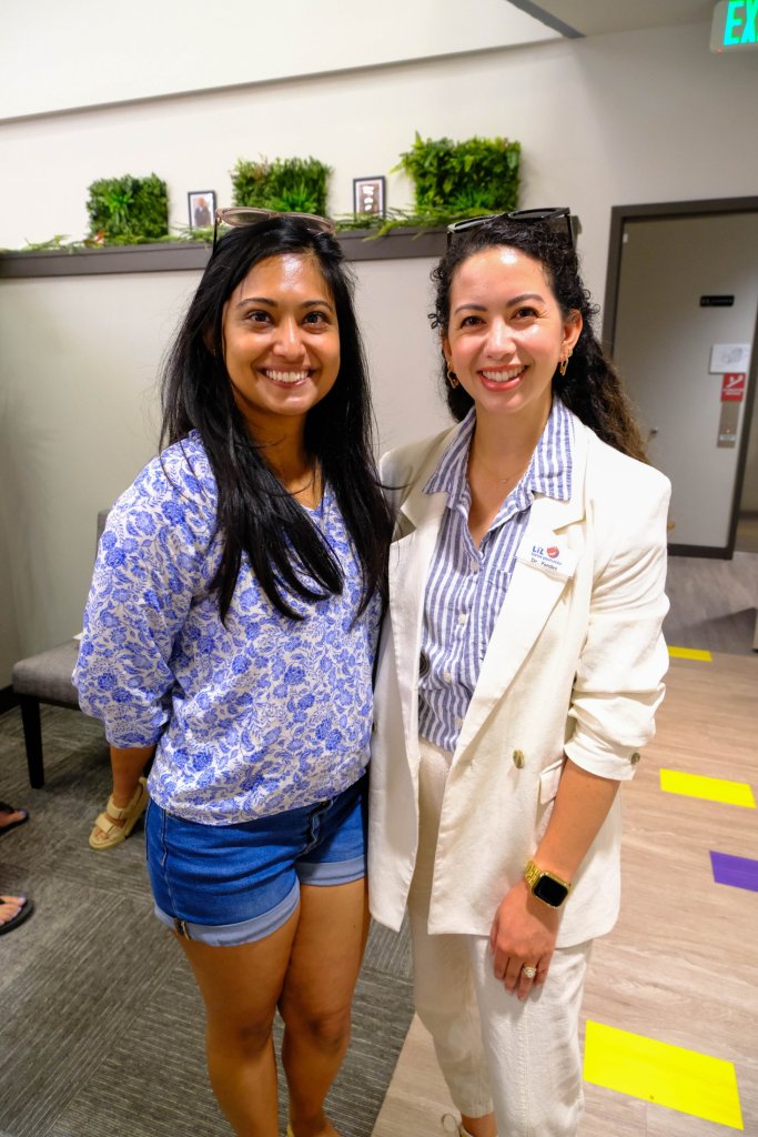 Two ladies smiling