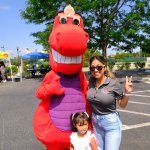 Mascot with children smiling